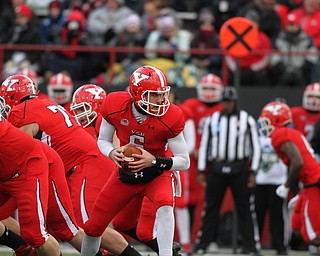Youngstown State Penguin junior quarterback Hunter Wells (6) looks for a runningback after taking the snap during the first half as Youngstown State takes on Wofford College in the FCS quarterfinals at Stambaugh Stadium in Youngstown on Saturday, Dec. 10, 2016. Youngstown State won in double overtime, 30-23, advancing to the semifinals...(Nikos Frazier | The Vindicator)..