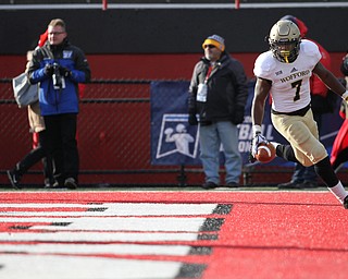 Wofford College Terrier senior fullback Lorenzo Long (7) celebrates in the endzone after running in a touchdown during the first half as Youngstown State takes on Wofford College in the FCS quarterfinals at Stambaugh Stadium in Youngstown on Saturday, Dec. 10, 2016. Youngstown State won in double overtime, 30-23, advancing to the semifinals...(Nikos Frazier | The Vindicator)..