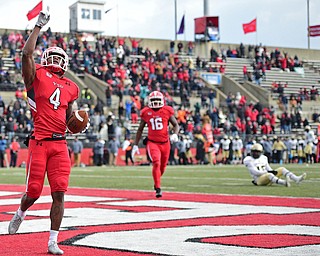 YOUNGSTOWN, OHIO - DECEMBER 10, 2016: Damoun Patterson #4 of YSU celebrates after scoring a touchdown during the first half of their FCS quarterfinal playoff game Saturday afternoon at Stambaugh Stadium. DAVID DERMER | THE VINDICATOR