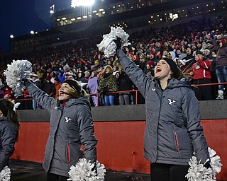 YOUNGSTOWN, OHIO - DECEMBER 10, 2016: YSU cheerleaders scream on the sideline before a fourth down play during the second overtime of their FCS quarterfinal playoff game Saturday afternoon at Stambaugh Stadium. YSU won 30-23 in double overtime. DAVID DERMER | THE VINDICATOR
