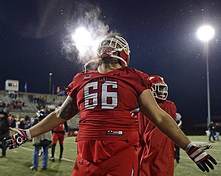 YOUNGSTOWN, OHIO - DECEMBER 10, 2016: Cody Squiric #66 of YSU celebrates after defeating Wofford 30-23 in double overtime Saturday afternoon at Stambaugh Stadium. DAVID DERMER | THE VINDICATOR