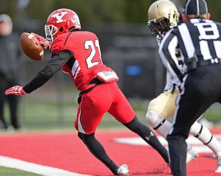 YOUNGSTOWN, OHIO - DECEMBER 10, 2016: Darien Townsend #21 of YSU holds on to the ball while dragging his feet in the end zone to score a touchdown during the first half of their FCS quarterfinal playoff game Saturday afternoon at Stambaugh Stadium. YSU won 30-23 in double overtime. DAVID DERMER | THE VINDICATOR