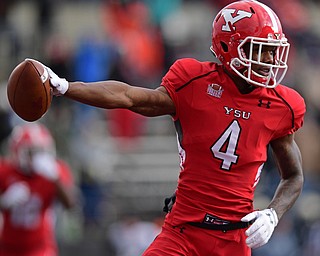 YOUNGSTOWN, OHIO - DECEMBER 10, 2016: Damoun Patterson #4 of YSU sticks the ball out while running into the end zone to score a touchdown during the first half of their FCS quarterfinal playoff game Saturday afternoon at Stambaugh Stadium. YSU won 30-23 in double overtime. DAVID DERMER | THE VINDICATOR