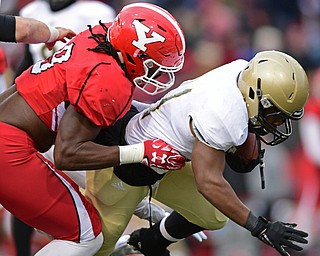 YOUNGSTOWN, OHIO - DECEMBER 10, 2016: Avery Moss #9 of YSU tackles Blake Morgan #11 of Wofford during the second half of their FCS quarterfinal playoff game Saturday afternoon at Stambaugh Stadium. YSU won 30-23 in double overtime. DAVID DERMER | THE VINDICATOR