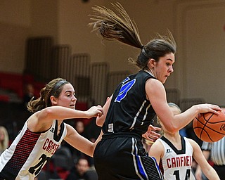 CANFIELD, OHIO - DECEMBER 12, 2016: Annie Pavlansky #10 of Lakeview spins to the basket while being pressured by Alexandra Stanic #20 of Canfield during the second half of their game Monday night at Canfield High School. DAVID DERMER | THE VINDICATOR
