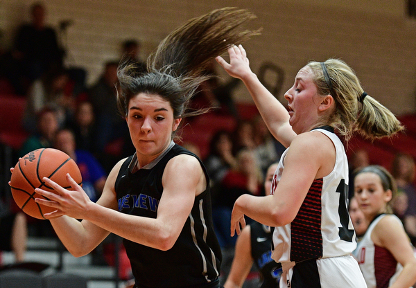 CANFIELD, OHIO - DECEMBER 12, 2016: Annie Pavlansky #10 of Lakeview drives on Jill Baker #15 of Canfield during the second half of their game Monday night at Canfield High School. DAVID DERMER | THE VINDICATOR