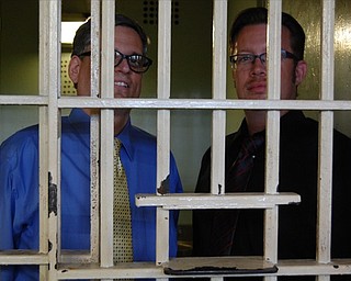 Neighbors | Submitted.Ursuline Principal Matt Sammartino and Cardinal Mooney Principal Mark Vollmer were held at the Youngstown City Jail as part of a joint charity event between the schools.