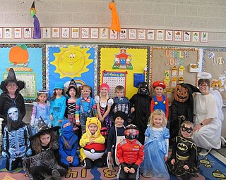 Neighbors | Alexis Bartolomucci.Terry Wittenauer's class dressed up in their Halloween costumes on Oct. 31 for the parade at North Preschool.