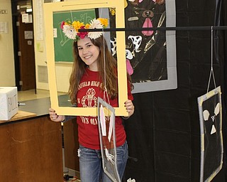 Neighbors | Abby Slanker.Canfield High School senior physics student Samantha Carney and her group turned to social media for their inspiration in creating their interactive Snapchat mobile for the school’s annual Mobile Mania Day on Nov. 2.