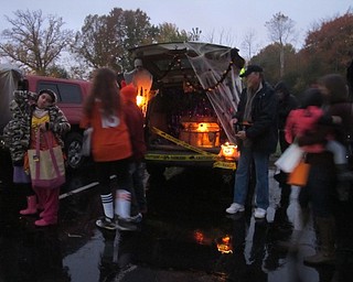 Neighbors | Alexis Bartolomucci.Guests stopped at each car during the Trunk or Treat event at Poland United Methodist Church on Oct. 30.