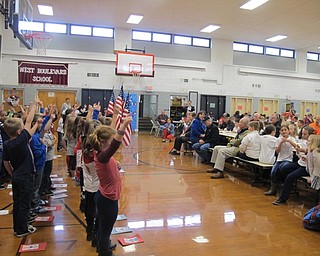 Neighbors | Alexis Bartolomucci.Students at West Boulevard put on a presentation for other students and veterans during the Veterans Day lunch on Nov. 11.