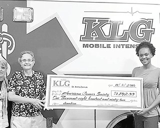 SPECIAL TO THE VINDICATOR
KLG Mobile Intensive Company and American Legion Post 290 of Columbiana hosted a benefit on Nov. 5 for Dr. Anita Ziemak, director of KLG and a victim of pancreatic cancer. The event featured a 50-50 raffle and a basket auction and raised $1,892, which was donated to the American Cancer Society in Ziemak’s name. From left, are Patty Steeves, KLG public relations and event coordinator; Ziemak; Renee Walker, American Cancer Society community manager; and Karl Griggs, KLG president.