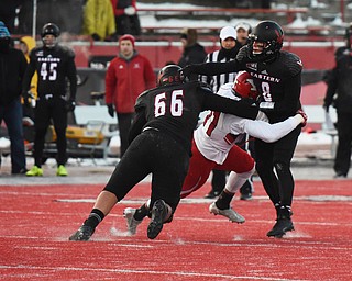 CHENEY, WA - DECEMBER 17: Youngstown State defensive end Derek Rivers (11) gets to EWU quarterback Gage Gubrud (8) right after he delivers a pass during the game between the Youngstown State University Penguins and the Eastern Washington University Eagles on December 17, 2016 at Roos Field in Cheney, Washington.  (Photo by Robert Johnson).