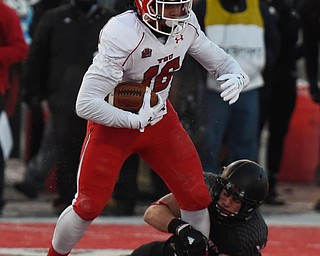 CHENEY, WA - DECEMBER 17: Youngstown State free safety Jalyn Powell (16) is brought down by an EWU defender after he intercepted a pass during the game between the Youngstown State University Penguins and the Eastern Washington University Eagles on December 17, 2016 at Roos Field in Cheney, Washington.  (Photo by Robert Johnson).