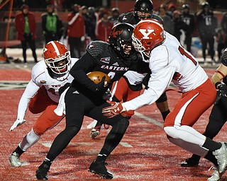 CHENEY, WA - DECEMBER 17: Youngstown State defensive end Derek Rivers (11) and linebacker Armand Dellovade (42) close in on EWU quarterback Gage Gubrud (8) for a sack during the game between the Youngstown State University Penguins and the Eastern Washington University Eagles on December 17, 2016 at Roos Field in Cheney, Washington.  (Photo by Robert Johnson).