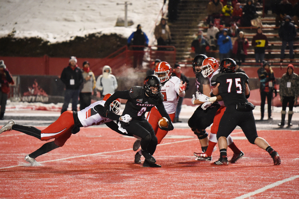 CHENEY, WA - DECEMBER 17: Youngstown State sophomore linebacker Lee Wright (5) catches EWU sophomore quarterback Gage Gubrud (8) from behind during the game between the Youngstown State University Penguins and the Eastern Washington University Eagles on December 17, 2016 at Roos Field in Cheney, Washington.  (Photo by Robert Johnson).