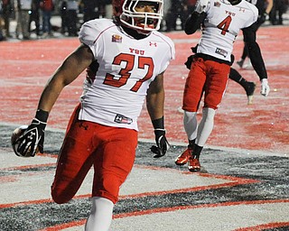 CHENEY, WA - DECEMBER 17: Youngstown State freshman running back Tevin McCaster (37) after scoring during the game between the Youngstown State University Penguins and the Eastern Washington University Eagles on December 17, 2016 at Roos Field in Cheney, Washington.  (Photo by Robert Johnson).