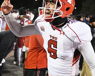 CHENEY, WA - DECEMBER 17: Youngstown State quarterback Hunter Wells (6) celebrates after the winning-catch during the game between the Youngstown State University Penguins and the Eastern Washington University Eagles on December 17, 2016 at Roos Field in Cheney, Washington.  (Photo by Robert Johnson).