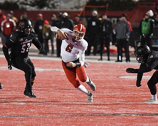 3CHENEY, WA - DECEMBER 17: Youngstown State sophomore quarterback Hunter Wells (6) scrambles for a key first down on the last drive of the game between the Youngstown State University Penguins and the Eastern Washington University Eagles on December 17, 2016 at Roos Field in Cheney, Washington.  (Photo by Robert Johnson).
