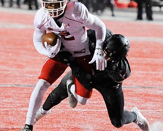 CHENEY, WA - DECEMBER 17: Youngstown State senior running back Demond Hymes (5) is hauled down after making a catch during the game between the Youngstown State University Penguins and the Eastern Washington University Eagles on December 17, 2016 at Roos Field in Cheney, Washington.  (Photo by Robert Johnson).