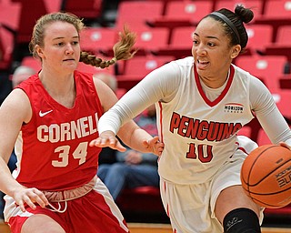 YOUNGSTOWN, OHIO - DECEMBER 17, 2016: Mailee Jones #10 of YSU drives on Marie Hatch #34 of Cornell during the first half of their game Saturday afternoon at the Beeghly Center. Cornell won 80-75. DAVID DERMER | THE VINDICATOR