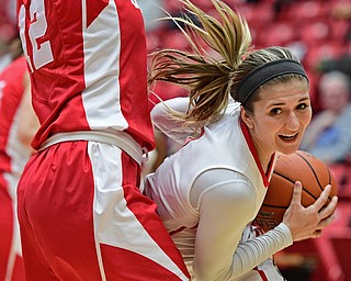 YOUNGSTOWN, OHIO - DECEMBER 17, 2016: Alison Smolinski #2 of YSU drives on Samantha Widmann #12 of Cornell during the first half of their game Saturday afternoon at the Beeghly Center. Cornell won 80-75. DAVID DERMER | THE VINDICATOR