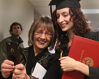William D. Lewis The Vindicator  YSU grad Julia Mangeri and her mom Tia Mangeri of Warren snap a selfie after12182016 YSU commencement ceremony.