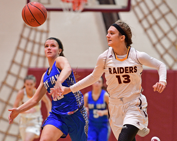 CANFIELD, OHIO - DECEMBER 19, 2016: Maddie Durkin #13 of South Range and Michaelina Terranova #22 of Jackson Milton chase after the ball on the South Range in bounds pass during the second half of their game Monday night at South Range High School. DAVID DERMER | THE VINDICATOR