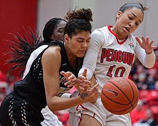YOUNGSTOWN, OHIO - DECEMBER 21, 2016: Baylee Buleca #55 of Point Park collides with Mailee Jones #10 of YSU as the two battle for a rebound during the first half of their game Tuesday morning at Beeghly Center. YSU won 84-71. DAVID DERMER | THE VINDICATOR