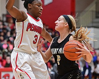 YOUNGSTOWN, OHIO - DECEMBER 21, 2016: Baylie Mook #5 of Point Park is cut off by Indiya Benjamin #3 of YSU during the second half of their game Tuesday morning at Beeghly Center. YSU won 84-71. DAVID DERMER | THE VINDICATOR