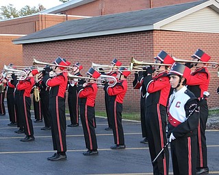Neighbors | Abby Slanker.The Cardinal Pride Marching Band performed for the crowd at the Canfield Community Tailgate Oct. 28.