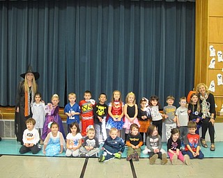 Neighbors | Alexis Bartolomucci.Samantha Cox and Joy Bucci stood with their classes on Halloween dressed in costumes at Poland North Preschool.