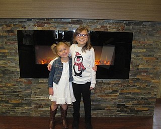 Neighbors | Alexis Bartolomucci.Abby Tringhese stood with her sister Hannah Tringhese at Greenrbiar Healthcare Center after receiving a check to help support #HannahStrong on Nov. 9.