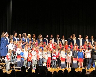 Neighbors | Alexis Bartolomucci.Dobbins Elementary third-grade students performed songs with the high school students during their Veteran's Day concert at Poland Seminary High School on Nov. 10.
