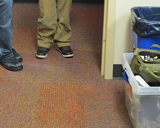 Neighbors | Alexis Bartolomucci.One of the Austintown Elementary School students tried on his new shoes from Soles of Luv on Nov. 16.
