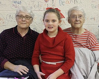 Neighbors | Abby Slanker.C.H. Campbell Elementary School second-grader Kaelyn Radinsky invited her ‘grand friends,’ Carolyn Wadas (left) and Marilyn Wadas (right), to the school’s annual Grandparents Day on Nov. 16.