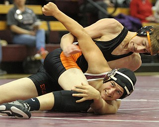 Ray Kaso(black) locks Kareem Hamden(red) on the ground in the Boardman High School Gymnasium on Thursday, Dec. 22, 2016...(Nikos Frazier | The Vindicator)..
