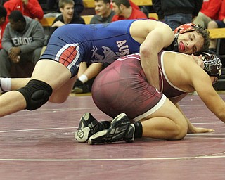Fitch's Michal Ferree(blue) attempts to reposition while pinning Boardman's Kareem Hamden(red) in the Boardman High School Gymnasium on Thursday, Dec. 22, 2016. 152 pounds..(Nikos Frazier | The Vindicator)..
