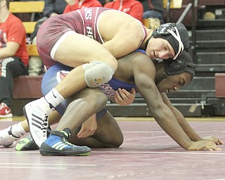 Boardman's Michael O'Horo(red) attempts to pin Fitch's Wille Beverly(blue) in the Boardman High School Gymnasium on Thursday, Dec. 22, 2016. 170 pounds..(Nikos Frazier | The Vindicator)..