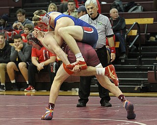 Fitch's Kyle Varga(top) tries to land on top of Boardman's Carlo DeNiro(red) in the Boardman High School Gymnasium on Thursday, Dec. 22, 2016. 182 pounds..(Nikos Frazier | The Vindicator)..