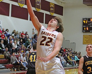 South Range's Hunter Solvesky (22) puts up a layup during the first half of Friday nights matchup against Crestview at South Range High School.  Dustin Livesay  |  The Vindicator  12/23/16  South Range High School.