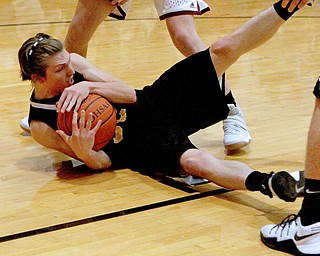 Crestview's Joey Flasco (32) dives to save the ball during the first half of Friday nights matchup at South Range High School.  Dustin Livesay  |  The Vindicator  12/23/16  South Range High School.