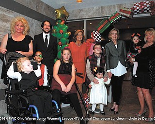 SPECIAL TO THE VINDICATOR
GFWC Ohio Warren Junior Women’s League recently hosted its 47th annual champagne luncheon benefit for the Children’s Rehabilitation Center’s “Children with Courage” fund. Mary Lou Jarrett, luncheon chairman, selected the theme “Christmas through the eyes of a child.” Children from CRC posed as models with holiday outfits from Macy’s in Eastwood Mall, donated by David Engler of Engler Law Firm. In front from left, are Mario Novello, Max Norwood and Alexa Ray. In back are Julie Vugrinovich, WJWL president; Michael J. Crogan Jr., CRC director; Jarrett; Jacob Crist; Zoe Shaffer; Carol Richardson, CRC president; and Kali Reed, held by Esther Gartland, style show coordinator.