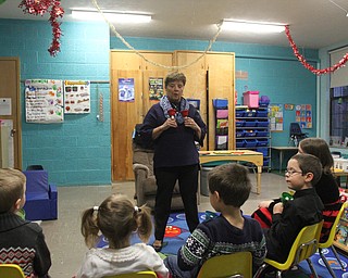 Debbie Chick instructs the kids before they participate in Ring-A-Lings at Boardman United Methodist Church in Boardman on Saturday, Dec. 24, 2016...(Nikos Frazier | The Vindicator)..