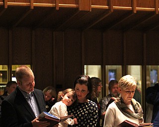 Tim, Charlotte(2), Allyson and Linda Russel at Boardman United Methodist Church in Boardman on Saturday, Dec. 24, 2016...(Nikos Frazier | The Vindicator)..