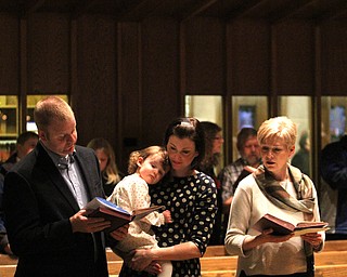 Tim, Charlotte(2), Allyson and Linda Russel at Boardman United Methodist Church in Boardman on Saturday, Dec. 24, 2016...(Nikos Frazier | The Vindicator)..