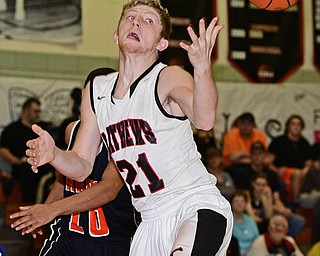 VIENNA, OHIO - DECEMBER 26, 2016: Tanner Hunt #21 of Mathews can't hang on to the pass from a teammate during the first half of their game Monday night at Mathews High School. DAVID DERMER | THE VINDICATOR