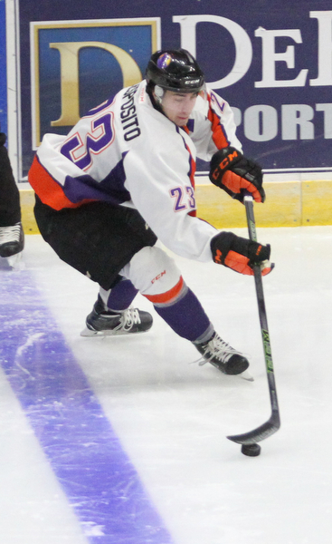 Youngstown Phantoms forward Alex Esposito (23) regains control of the puck before firing towards the goal during the first period as the Youngstown Phantoms take on the Muskegon Lumberjacks at the Covelli Centre in Youngstown on Tuesday, Dec. 27, 2016...(Nikos Frazier | The Vindicator)..