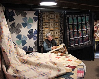 Neighbors | Abby Slanker.Clare Neff of Village Quilts demonstrated quilt making, while surrounded by her own quilts, at the Loghurst Farmhouse Museum Holiday Art Show on Nov. 19.