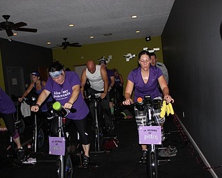 Neighbors | Abby Slanker.Riders at the third annual Turn It Purple Ride at Pure Cycle Spinning Studio worked up a sweat to raise awareness of pancreatic cancer and funds for research on Nov. 18.